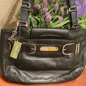 Black genuine leather Charles Davis purse new with tags